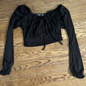 Black long sleeve crop top. I’m good condition size 0. Nasty Gal